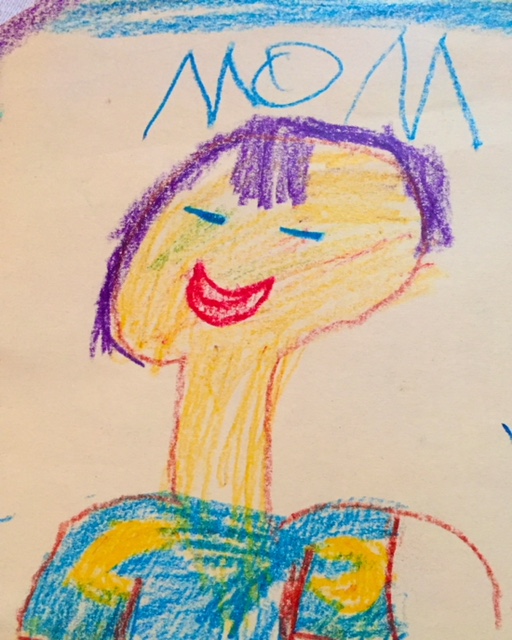 crayon drawing of a smiling purple-haired woman, with "MOM" written above it.